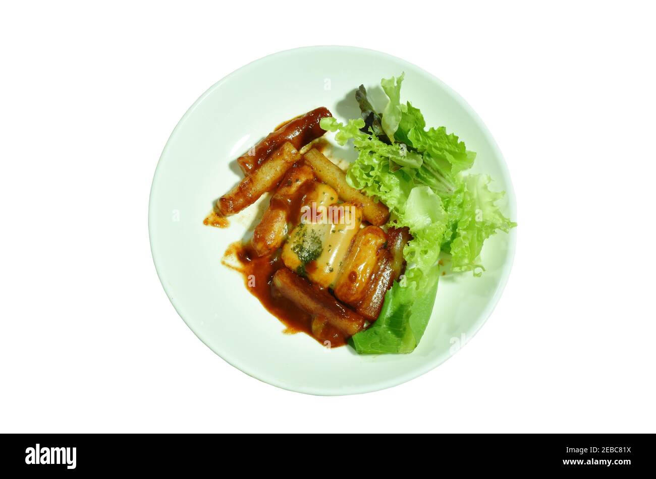 pork sausage dressing cheese and spicy chili sauce topping chop seaweed with vegetable on plate Stock Photo