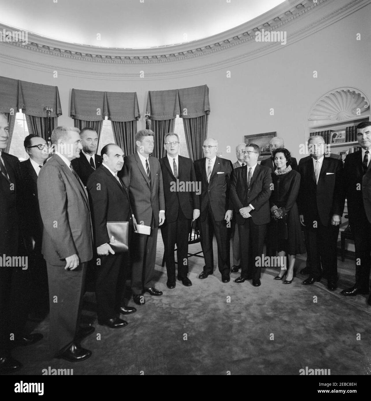 Meeting with the National Advisory Committee on Manpower Development and Training, 1:10PM. President John F. Kennedy meets with members of the National Advisory Committee on Manpower Development and Training. Left to right: Executive Vice President of W. R. Grace and Company, Felix E. Larkin; Deputy Assistant Secretary of Labor for Employment and Manpower, Seymour L. Wolfbein; Chairman of the Committee and Director of the Conservation of Human Resources Project at Columbia University, Dr. Eli Ginzberg; Vice President Lyndon B. Johnson; Secretary of the Department of Health, Education, and Welf Stock Photo