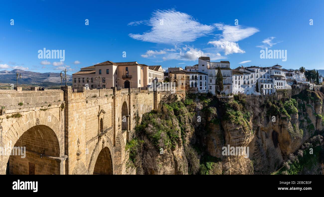 Ronda, Spain - 1 February, 2021: A view of the old town of Ronda and the Puente Nuevo over El Tajo Gorge Stock Photo