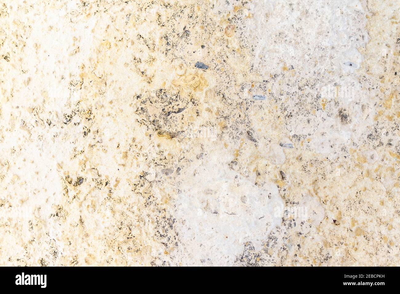Natural stone granite texture background. Granite texture with spots texture. Closeup pattern of beige granite Stock Photo