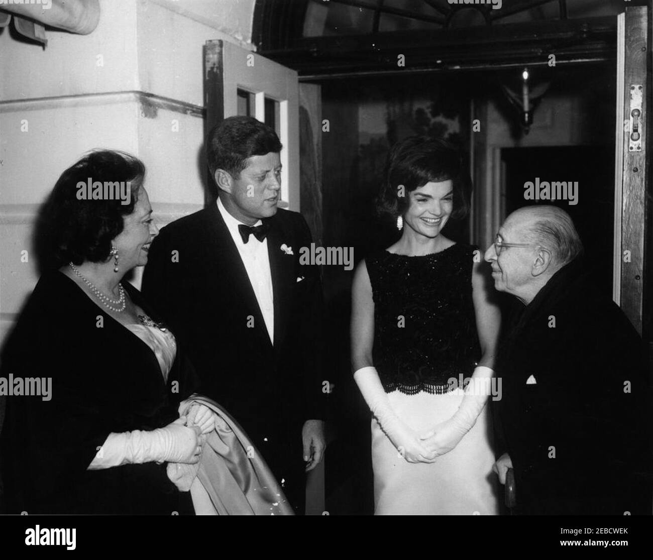 Dinner in honor of Igor Stravinsky, 8:00PM. President John F. Kennedy and First Lady Jacqueline Kennedy greet composer Igor Stravinsky and his wife Vera de Bosset Stravinsky as they arrive for a dinner party. White House, Washington, D.C. Stock Photo