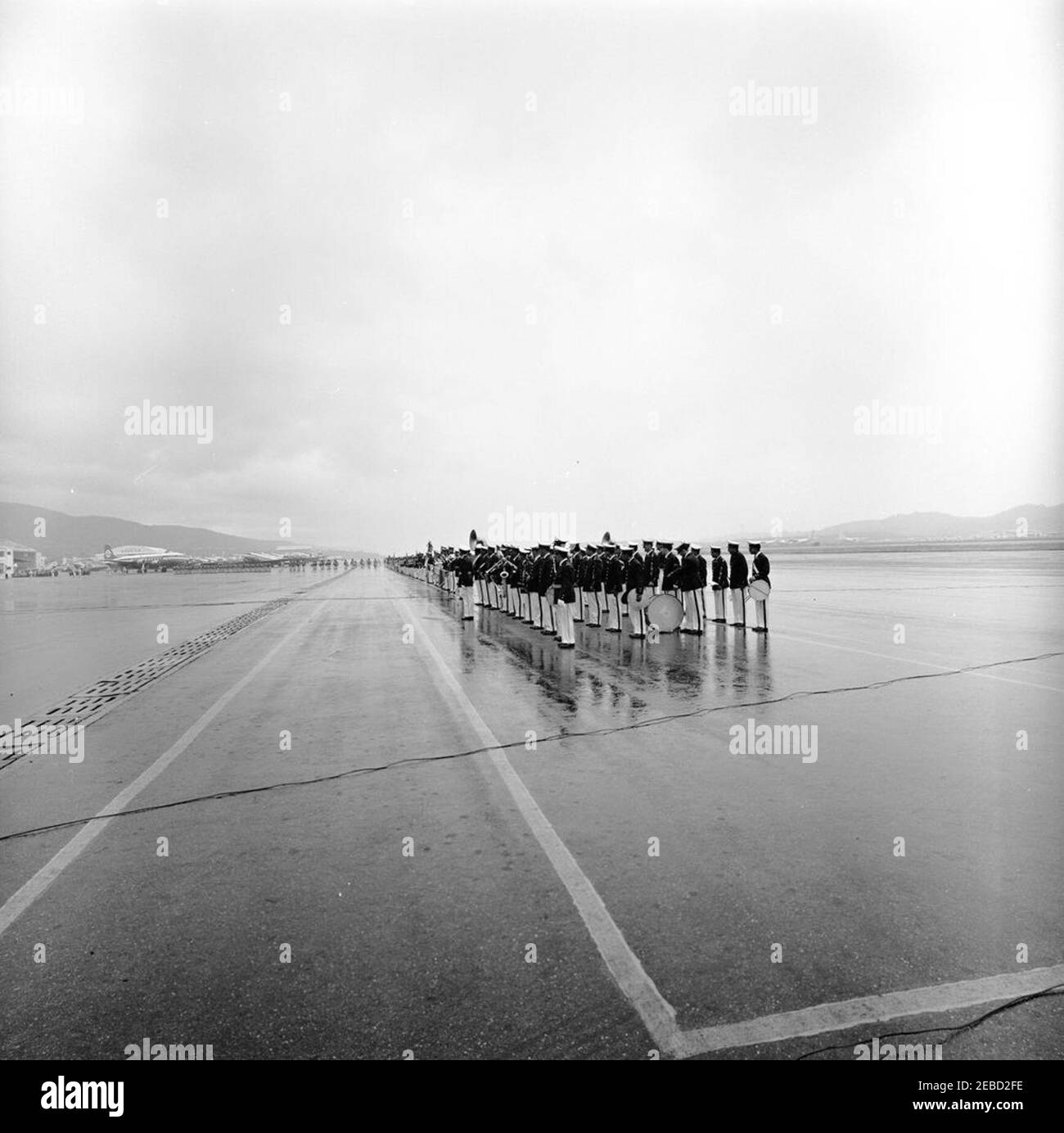 Trip to South America: Caracas, Venezuela, arrival, 9:00AM. Members of a Venezuelan military band stand in formation at Maiquetu00eda International Airport in Caracas, Venezuela, for the arrival of President John F. Kennedy and First Lady Jacqueline Kennedy. [Photograph by Harold Sellers] Stock Photo
