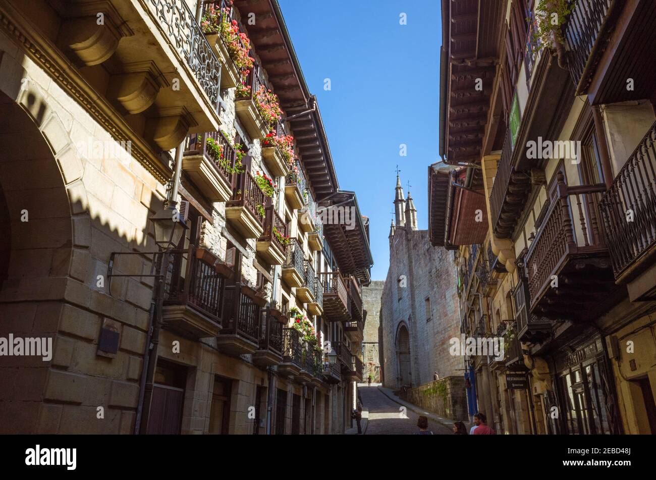 Hondarribia, Gipuzkoa, Basque Country, Spain - July 18th, 2019 : Monumental Calle Mayor main street of the Alde Zaharra or old town walled city. Incid Stock Photo