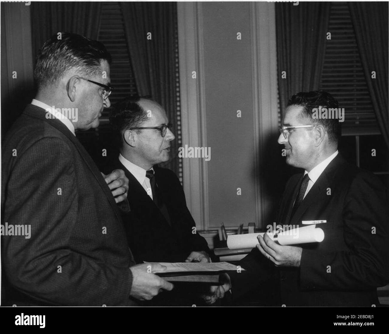 Swearing-in ceremony, Bernard Boutin as Administrator of General Services Administration. Swearing-in ceremony of Bernard L. Boutin as Administrator of the General Services Administration (GSA). (L-R) Herbert L. Miller, Assistant Executive Clerk of the White House; Frederick Dutton, Special Assistant to the President; Bernard Boutin. Ralph Dunganu2019s Office, White House, Washington, D.C. Stock Photo