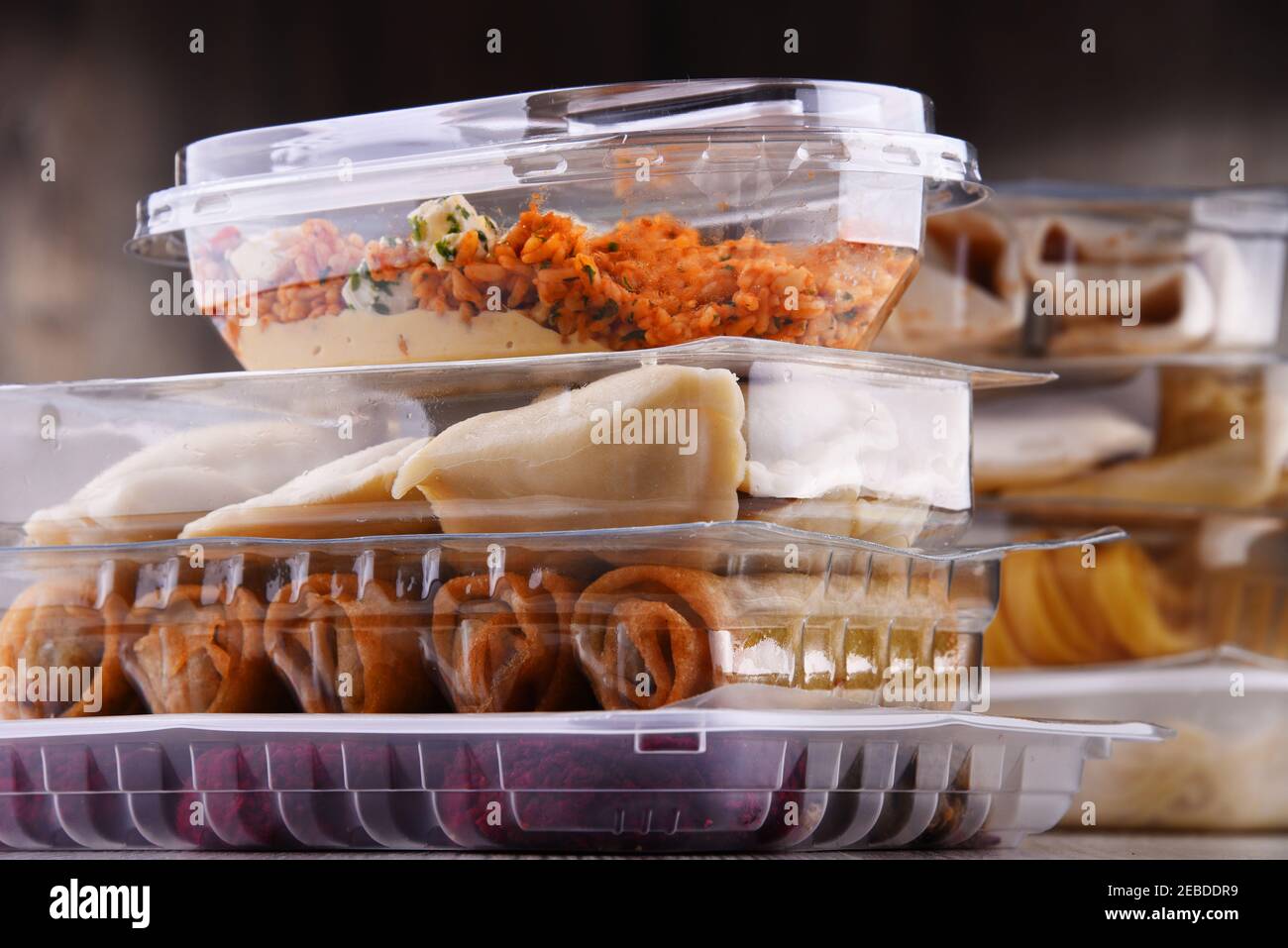 A variety of prepackaged food products in plastic boxes. Stock Photo