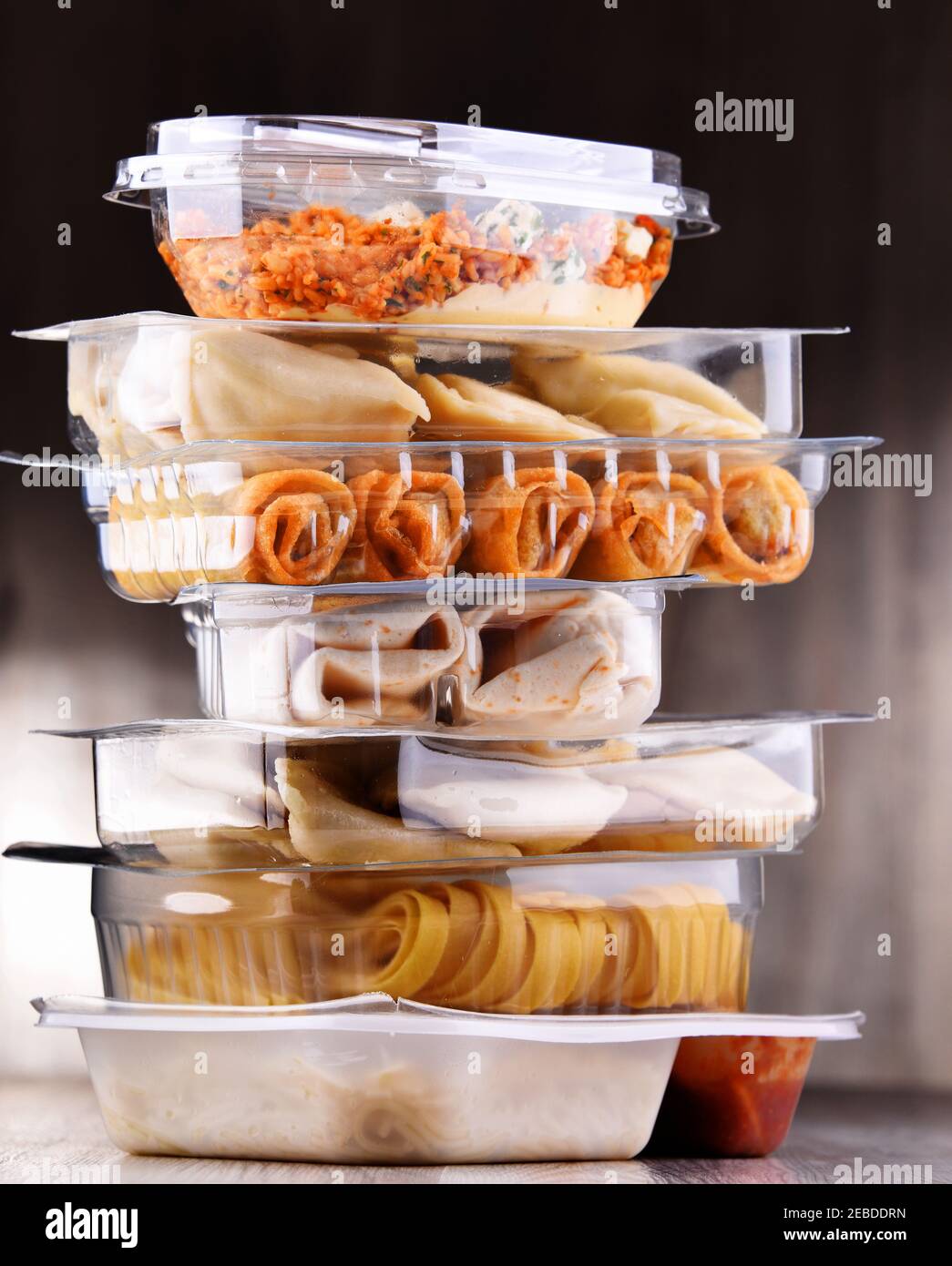 A variety of prepackaged food products in plastic boxes. Stock Photo