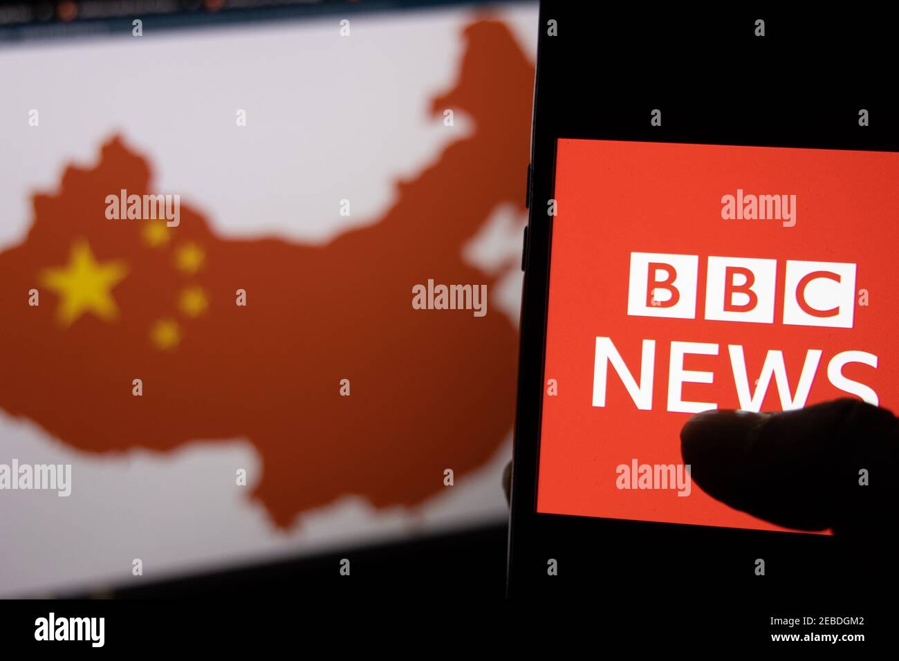 Kathmandu, Nepal - February 12 2021: BBC News Logo against the Map of China in red on a computer screen in the background. Stock Photo