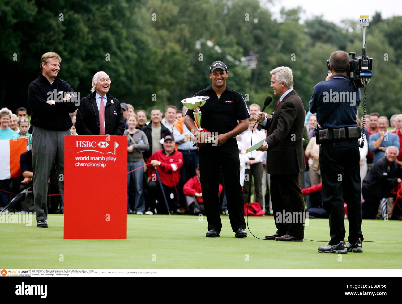 Golf - HSBC World Matchplay Championship - Wentworth Club, Surrey, England  - 18/9/05 Michael Campbell of New Zealand with presenter Steve Ryder ,  Ernie Els of South Africa and Sir John Bond -