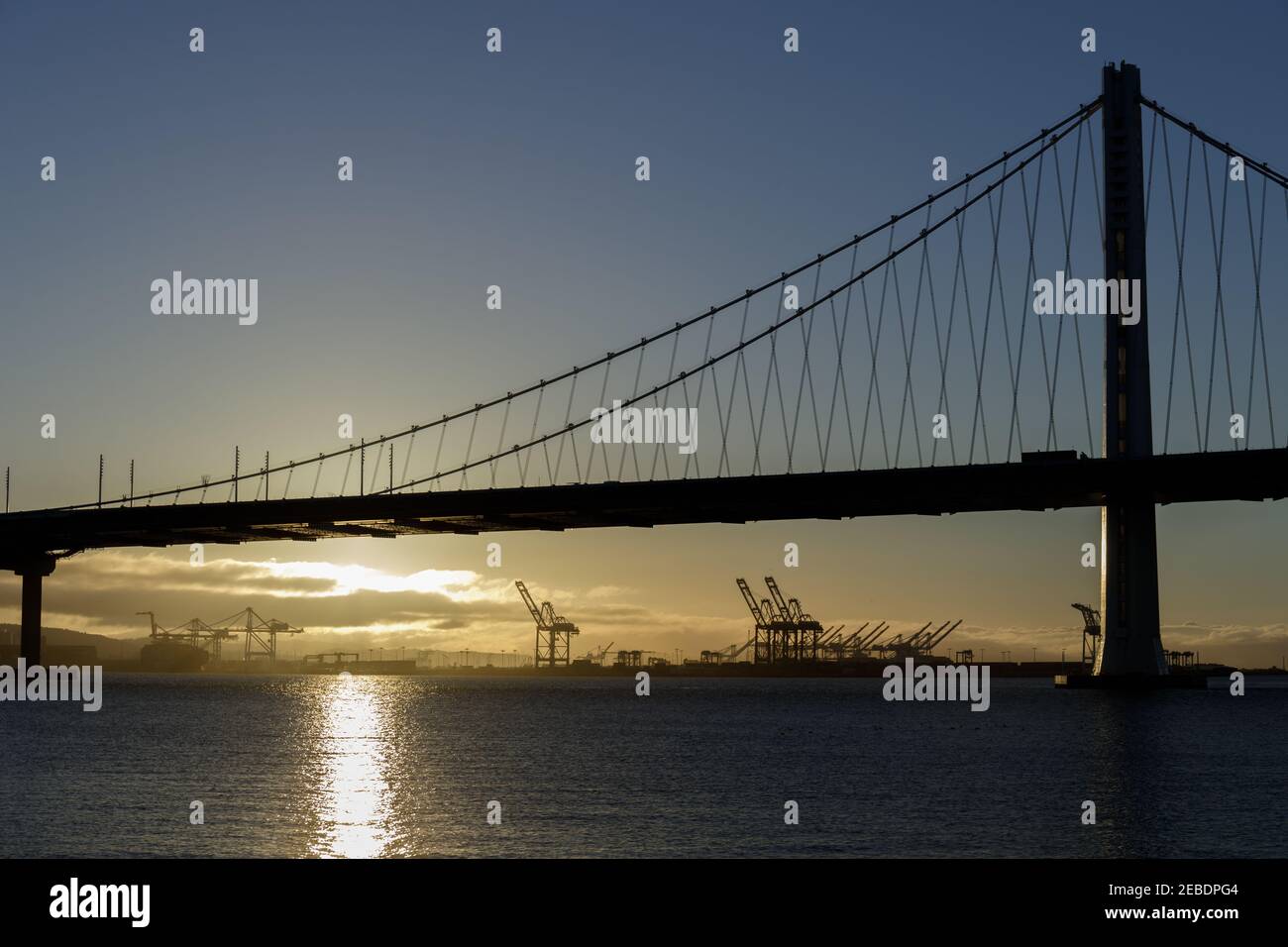Sun rising behind the San FranciscoOakland Bay Bridge Eastern Span and