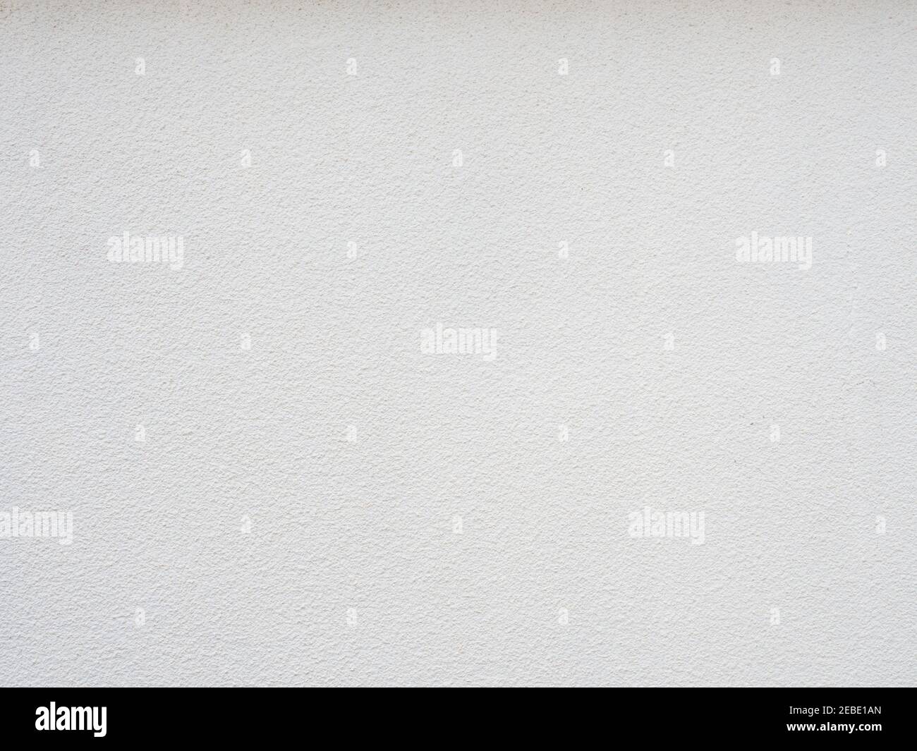 Wall with rough white plaster. Fullscreen photo. Not seamless texture Stock Photo
