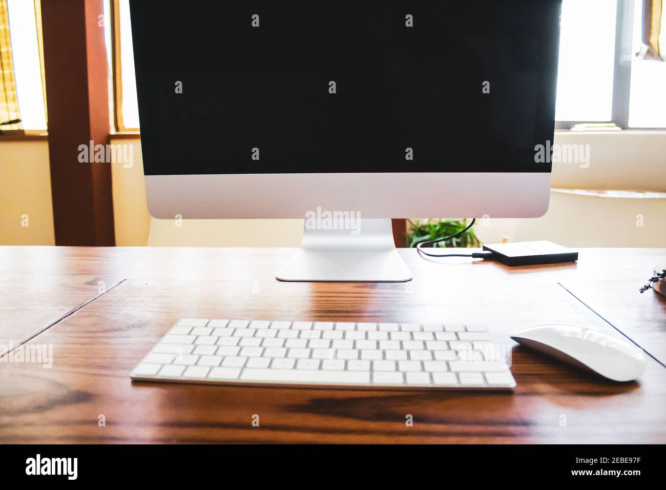 desktop computer on wooden table Stock Photo