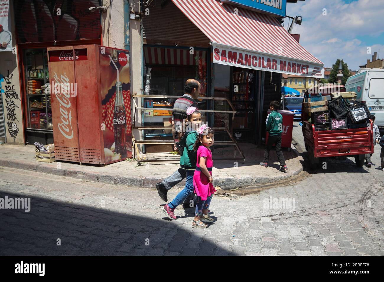 Father and children in downtown Konya Stock Photo