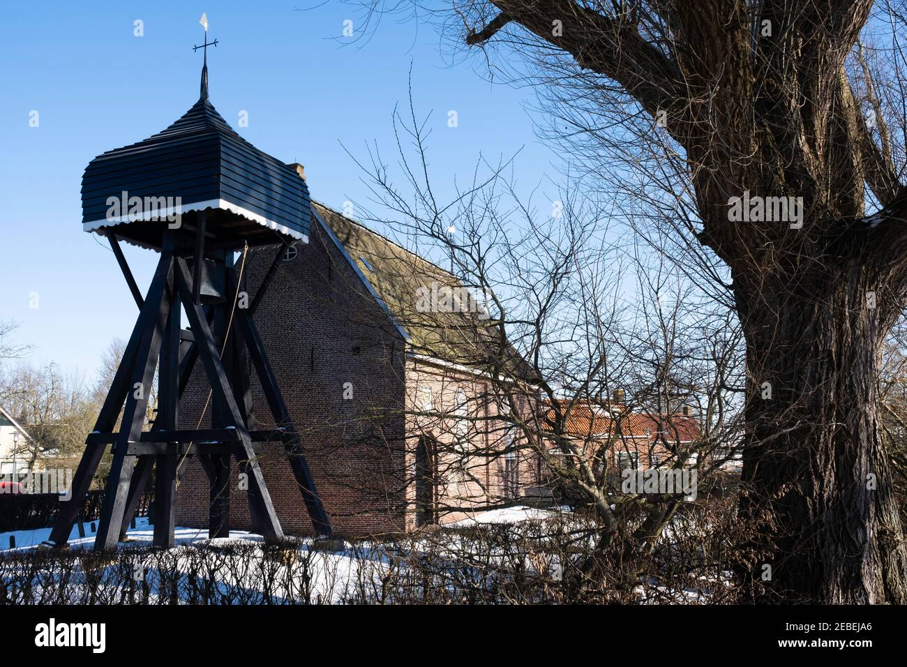 Reformed church with typical wooden bell tower 'Klokkenstoel' with