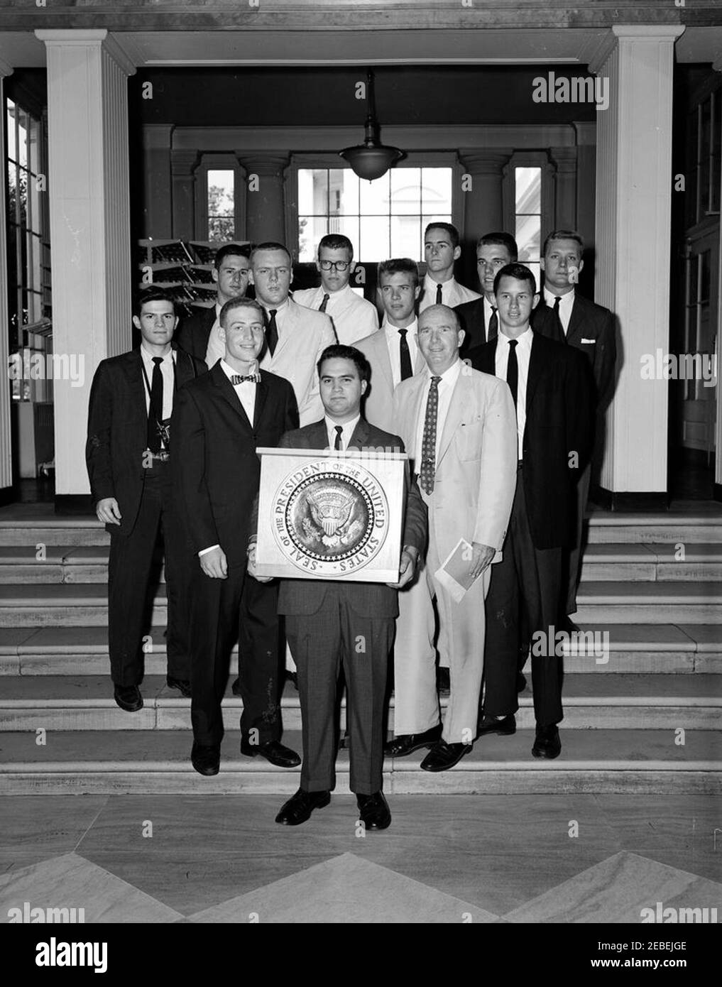 Phi Sigma Kappa Members of George Washington University present a rostrum  for President Kennedy (Special Assistant to the President Dave Powers). Phi  Sigma Kappa members from George Washington University present rostrum with