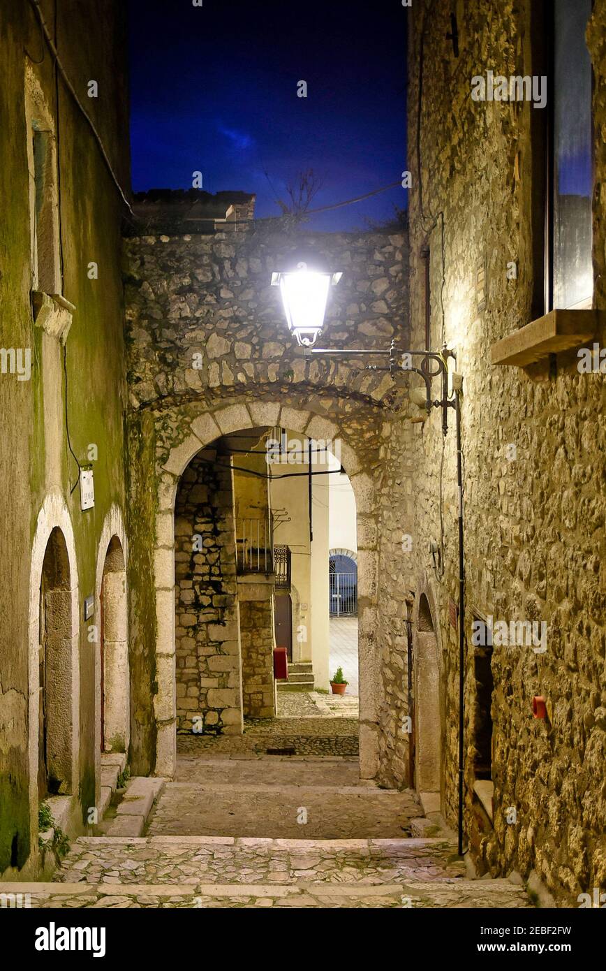 A narrow street between the old houses of Guardia Sanframondi, a