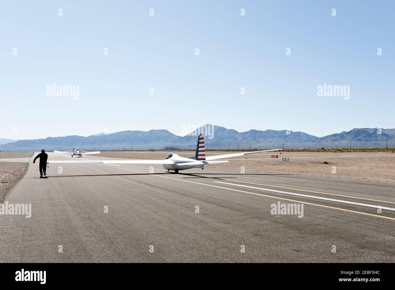 Gliders launch behind a tow plane at Jean Airport, Nevada, near Las