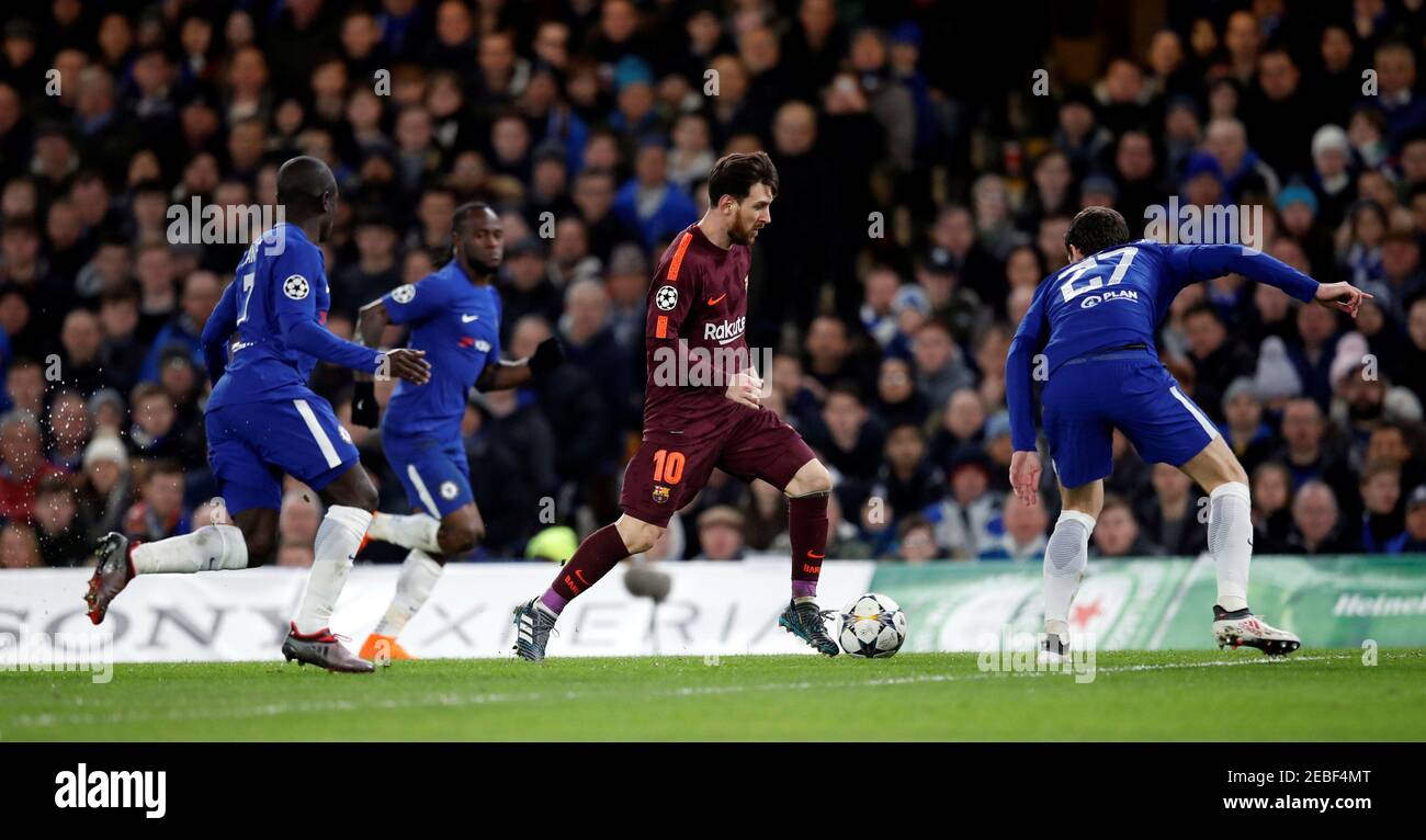 Soccer Football - Champions League Round of 16 First Leg - Chelsea vs FC Barcelona - Stamford Bridge, London, Britain - February 20, 2018   Barcelona’s Lionel Messi in action with Chelsea's Andreas Christensen, Victor Moses and N'Golo Kante   REUTERS/Eddie Keogh Stock Photo
