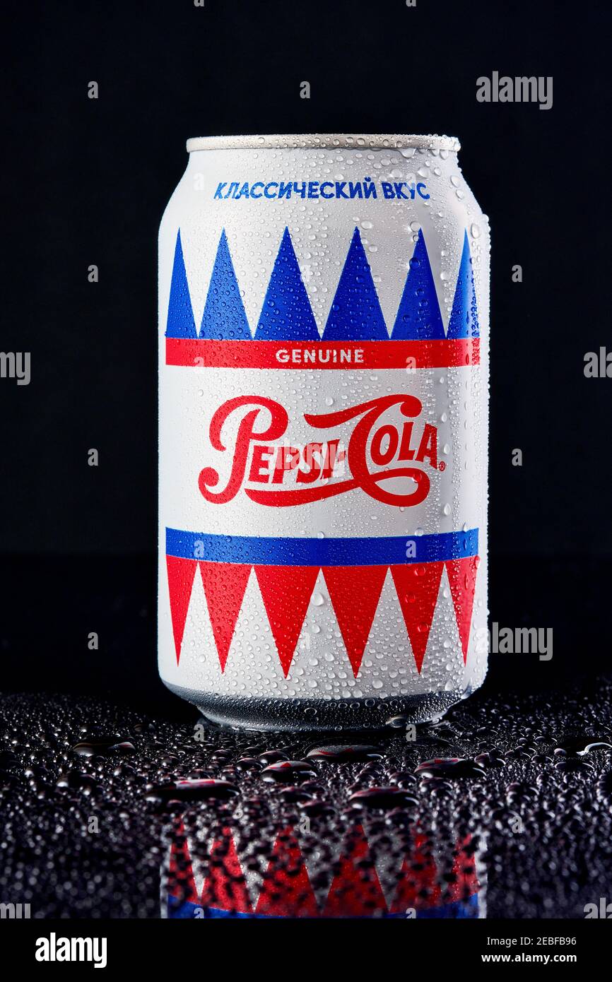 MOGILEV, BELARUS - JANUARY 29 2021: Can of Pepsi cola on ice over black background, Pepsi is a carbonated soft drink produced PepsiCo. Created in 1893 Stock Photo