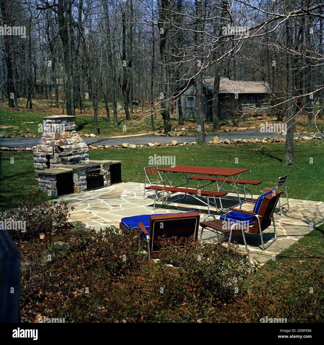 Camp David, views. View of the outdoor cooking area of Aspen Lodge, the  Presidential residence at Camp David in Frederick County, Maryland. Maple  Cabin is visible in the background Stock Photo -