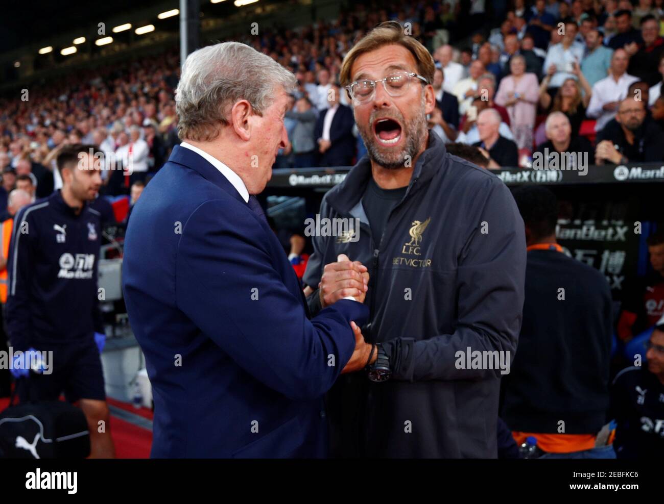 Soccer Football - Premier League - Crystal Palace v Liverpool - Selhurst Park, London, Britain - August 20, 2018  Crystal Palace manager Roy Hodgson with Liverpool manager Juergen Klopp before the match             REUTERS/Eddie Keogh  EDITORIAL USE ONLY. No use with unauthorized audio, video, data, fixture lists, club/league logos or 'live' services. Online in-match use limited to 75 images, no video emulation. No use in betting, games or single club/league/player publications.  Please contact your account representative for further details. Stock Photo