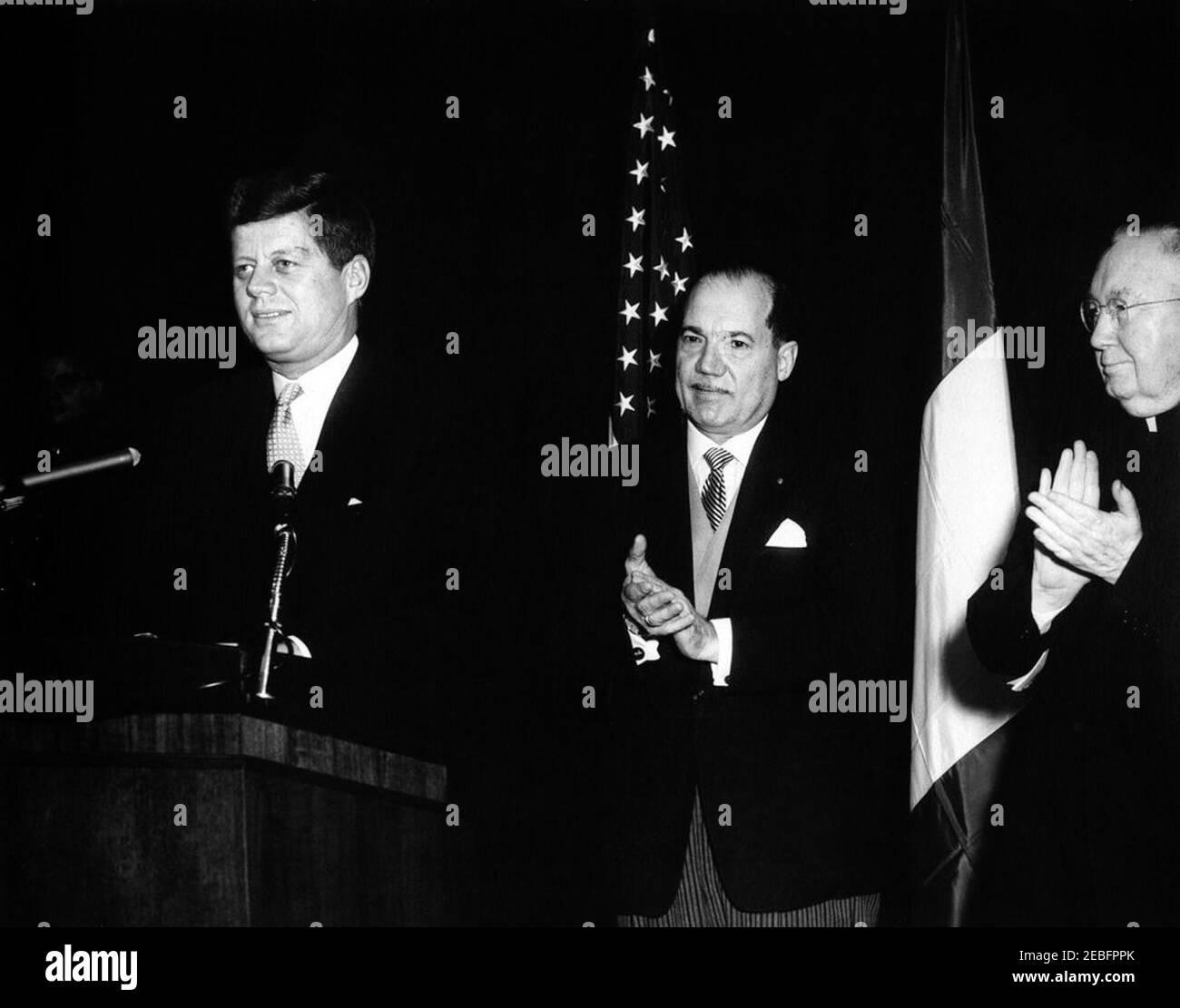 Ceremony celebrating the Unification of Italy, 10:31AM. Ceremony celebrating the Unification of Italy. L-R: President John F. Kennedy (with a cut above his left eye); Congressman Victor L. Anfuso (New York); Archbishop Patrick A. Ou2019Boyle. State Department, Washington, D.C.rnrn Stock Photo