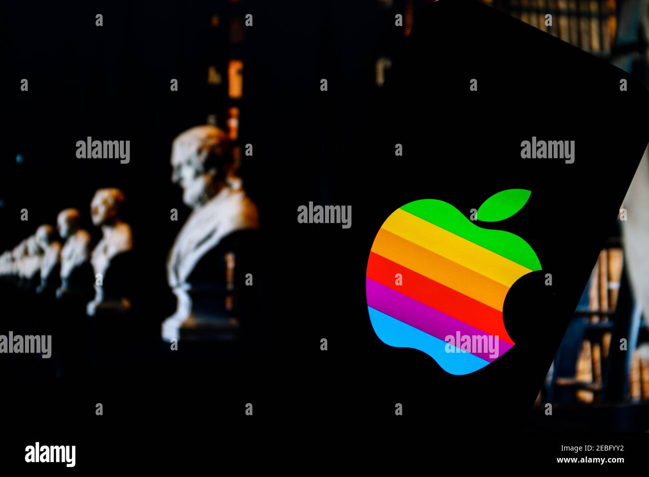 In this photo illustration an Apple technology company app logo seen displayed on a smartphone. Stock Photo