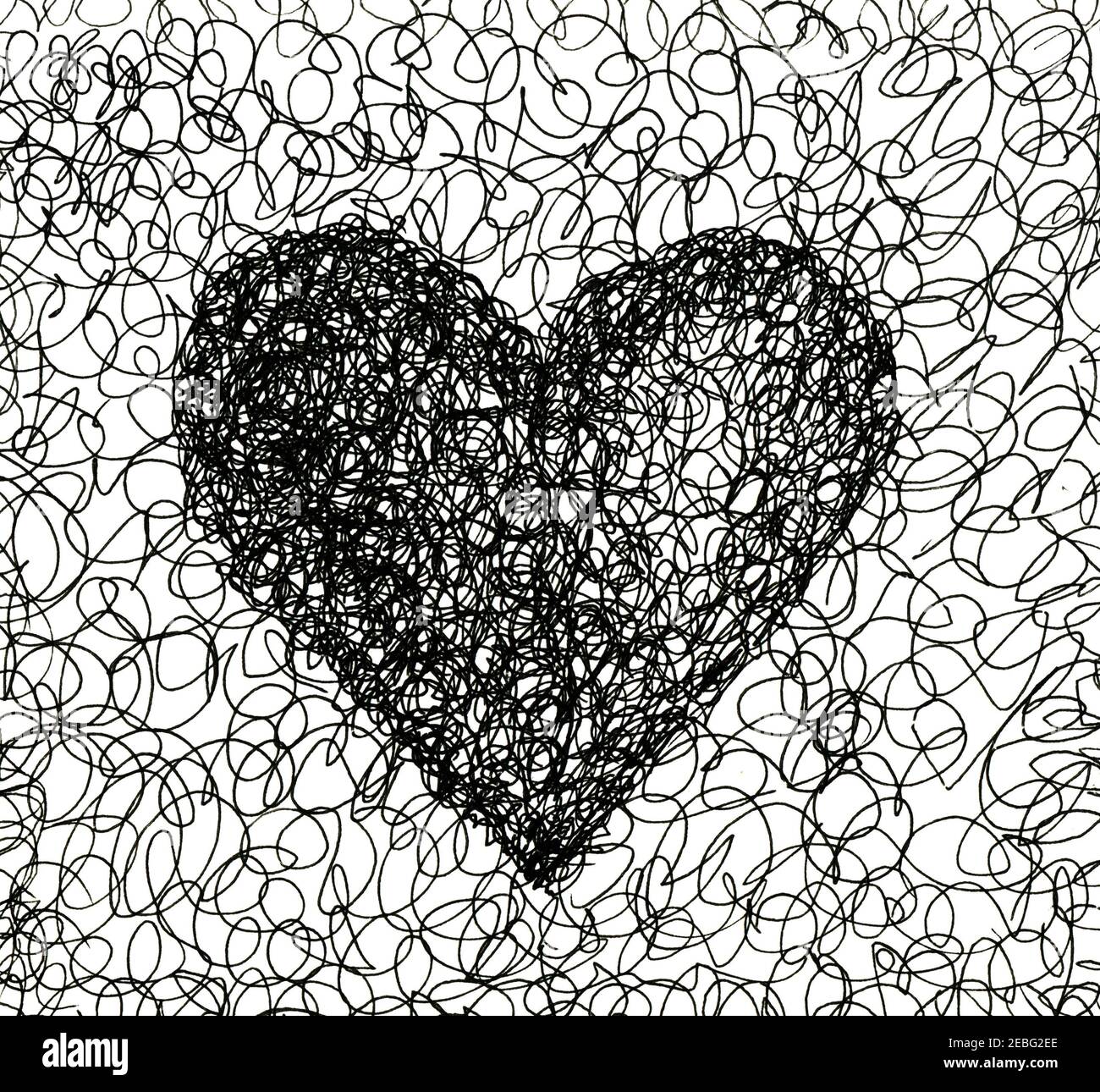 Ballpoint pen curl heart. Graphic black heart. Chaotic hand-drawn doodles. Valentine's Day. Love symbol. Stock Photo