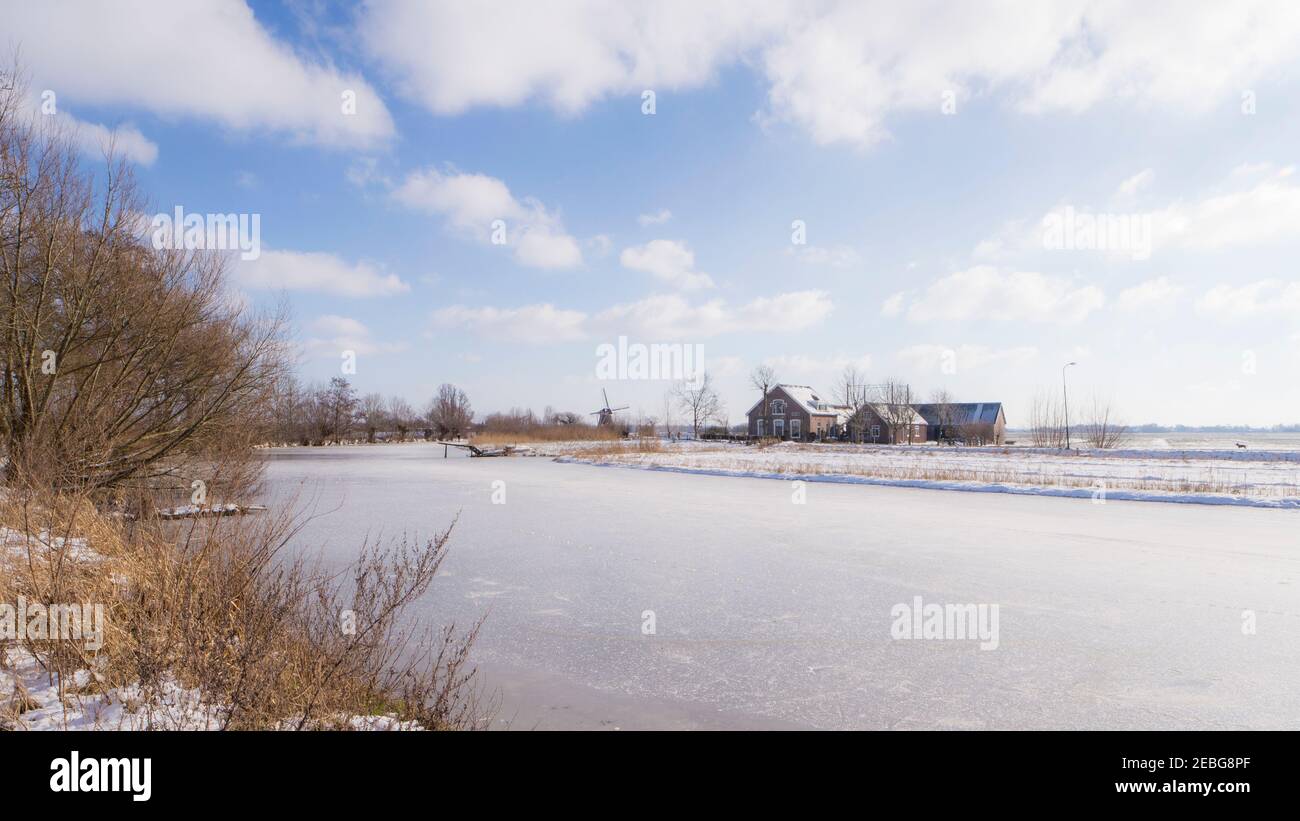 Landscape of the frozen Gein river Stock Photo - Alamy