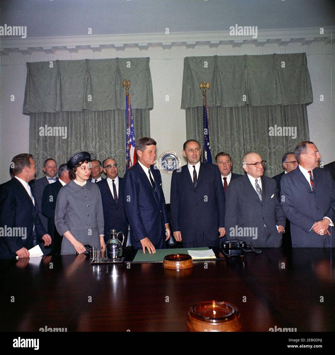 Meeting with the US Advisory Commission on International Educational u0026 Cultural Affairs, 12:10PM. President John F. Kennedy meets with the U.S. Advisory Commission on International Educational and Cultural Affairs in the Cabinet Room of the White House, Washington, D.C. (L-R) Assistant Secretary of State for Education and Cultural Affairs Philip H. Coombs (facing away); two unidentified; Mabel M. Smythe, Principal of New Lincoln High School, New York City; Senator J. W. Fulbright (Arkansas); Dr. Luther H. Foster, President of Tuskegee Institute; President Kennedy; Dr. John W. Gardner, Cha Stock Photo