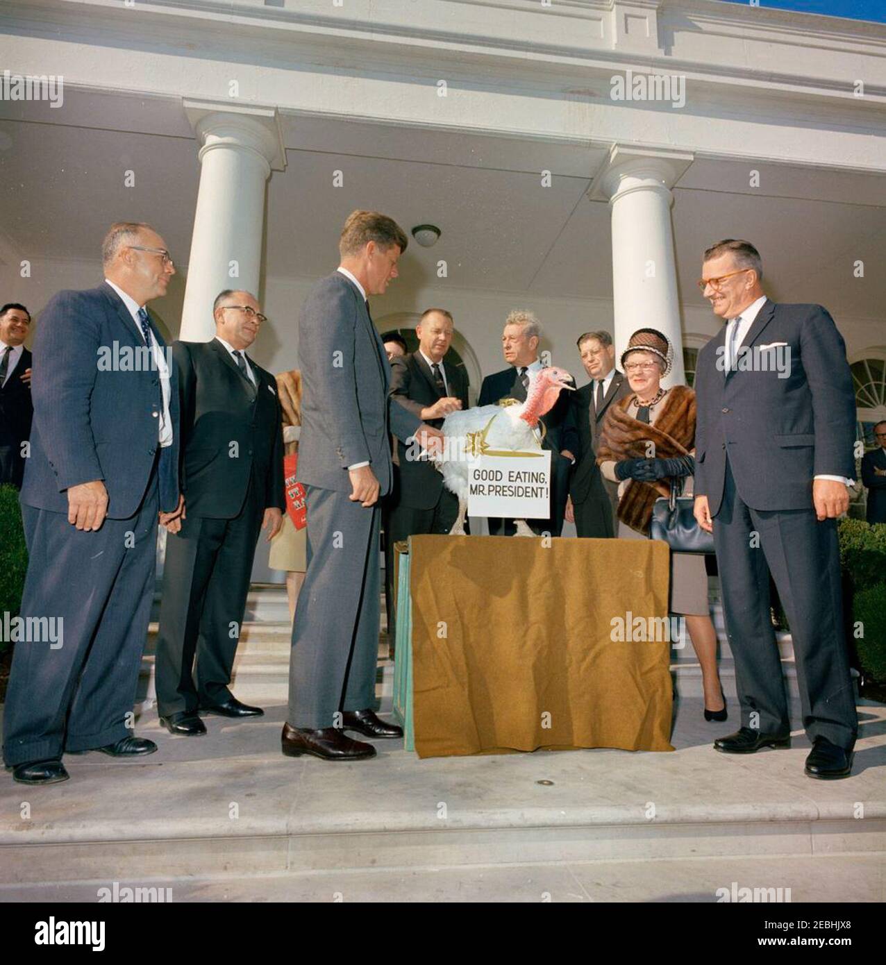 Presentation of a Thanksgiving Turkey to President Kennedy, 10:00AM. President John F. Kennedy receives a turkey presented to him for Thanksgiving by the National Turkey Federation and the Poultry and Egg National Board; President Kennedy pardoned the turkey. Left to right: Administrative Assistant to the President, Mike Manatos; Vice President of the National Turkey Federation, Morris G. Smith; unidentified; President Kennedy; President of the National Turkey Federation, Robert M. McPherrin; Senator Everett Dirksen (Illinois); Executive Secretary-Treasurer of the National Turkey Federation, M Stock Photo