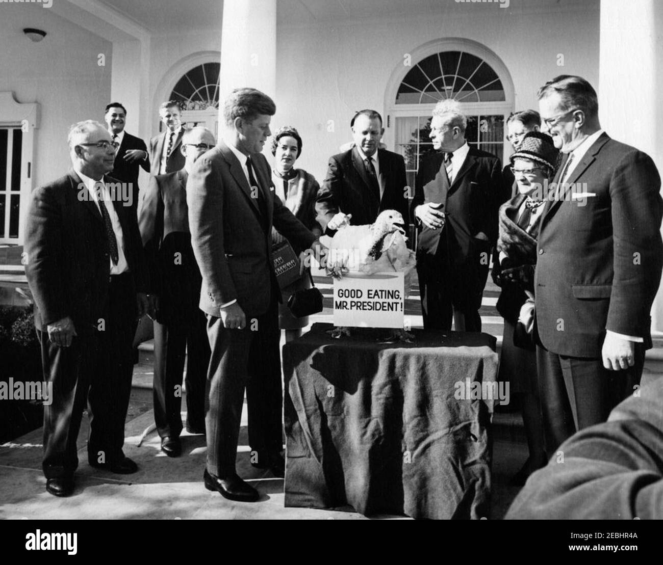 Presentation of a Thanksgiving Turkey to President Kennedy, 10:00AM. President John F. Kennedy receives a turkey presented to him for Thanksgiving by the National Turkey Federation and the Poultry and Egg National Board; President Kennedy pardoned the turkey. Left to right: Vice President of the National Turkey Federation, Morris G. Smith; Administrative Assistant to the President, Mike Manatos; two unidentified persons; President Kennedy; unidentified; President of the National Turkey Federation, Robert M. McPherrin; Senator Everett Dirksen (Illinois); Executive Secretary-Treasurer of the Nat Stock Photo