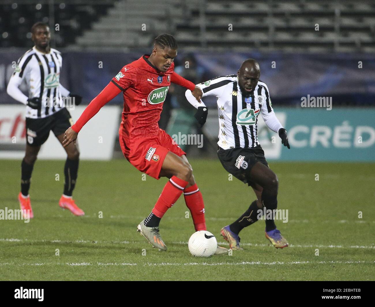 Gerzino Nyamsi of Rennes, Sada Thioub of Angers during the French Cup, round of 64 football match between SCO Angers and Stade Rennais (Rennes) on February 11, 2021 at Stade Raymond Kopa in Angers, France - Photo Jean Catuffe/DPPI/LiveMedia/Sipa USA Credit: Sipa USA/Alamy Live News Stock Photo