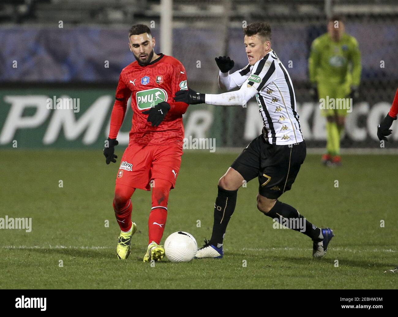 Romain Del Castillo of Rennes, Pierrick Capelle of Angers during the French Cup, round of 64 football match between SCO Angers and Stade Rennais (Rennes) on February 11, 2021 at Stade Raymond Kopa in Angers, France - Photo Jean Catuffe/DPPI/LiveMedia/Sipa USA Credit: Sipa USA/Alamy Live News Stock Photo