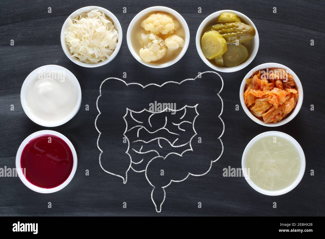Natural probiotics for healthy bowel. Probiotic as sauerkraut, pickled cauliflower, pickled cucumber, sauerkraut juice, kimchi, beetroot leaven and yo Stock Photo
