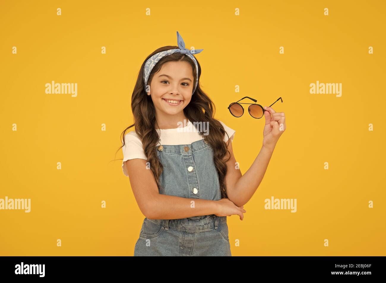 Friendly look. cheerful vintage girl on yellow background. little beauty at  hairdresser. love her retro fashion style. summer vacation. summer shopping  sales. pin up kid. happy childrens day Stock Photo - Alamy, image size:1300x955