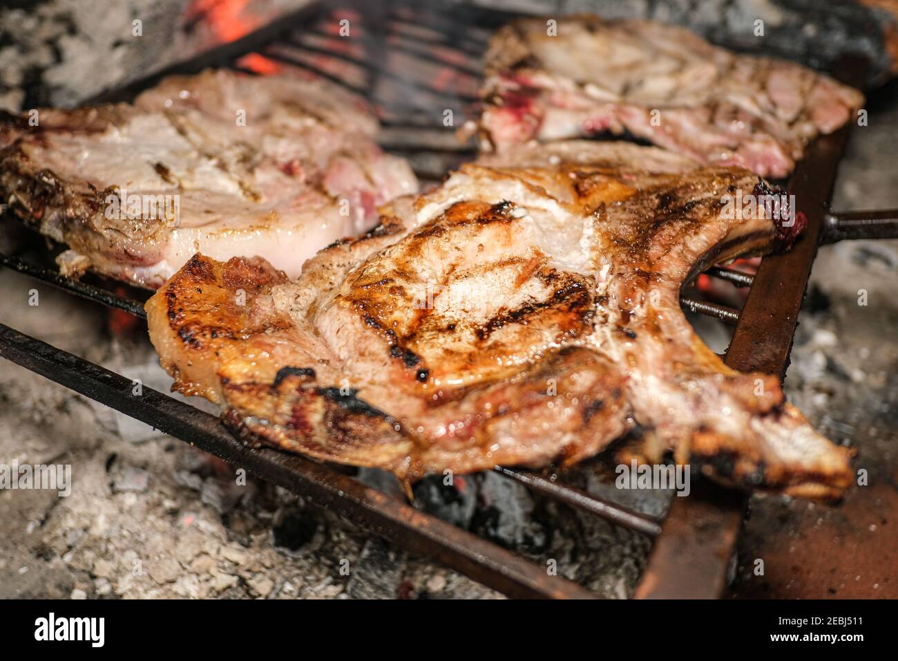 Grilling pork chop steak,grilled meat barbecue, tasty fat food lifestyle Stock Photo