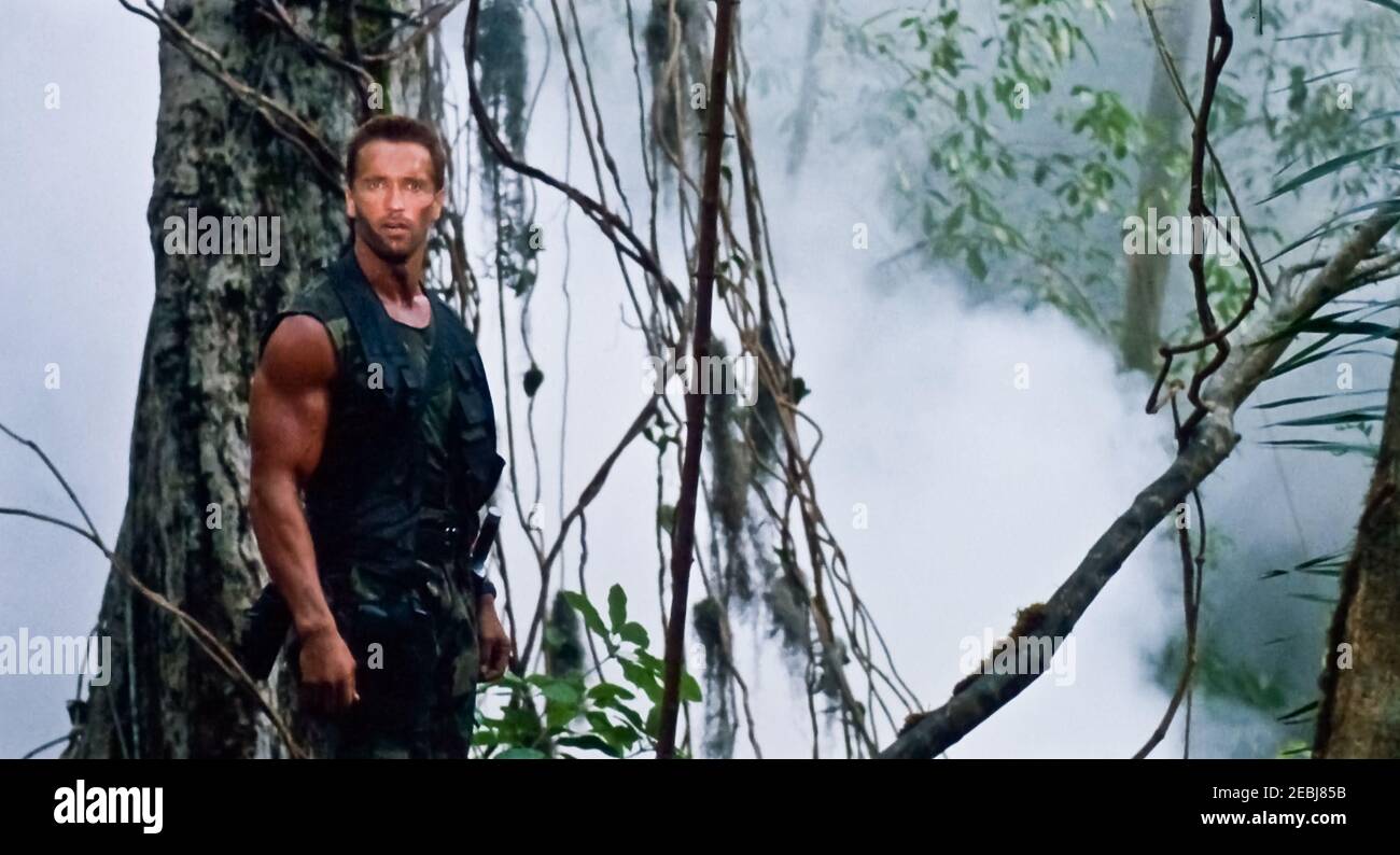 USA. Arnold Schwarzenegger  in a scene from the (C)Twentieth Century Fox film : Predator (1987). Plot: A team of commandos on a mission in a Central American jungle find themselves hunted by an extraterrestrial warrior.  Ref:  LMK110-J6918-11221 Supplied by LMKMEDIA. Editorial Only. Landmark Media is not the copyright owner of these Film or TV stills but provides a service only for recognised Media outlets. pictures@lmkmedia.com Stock Photo