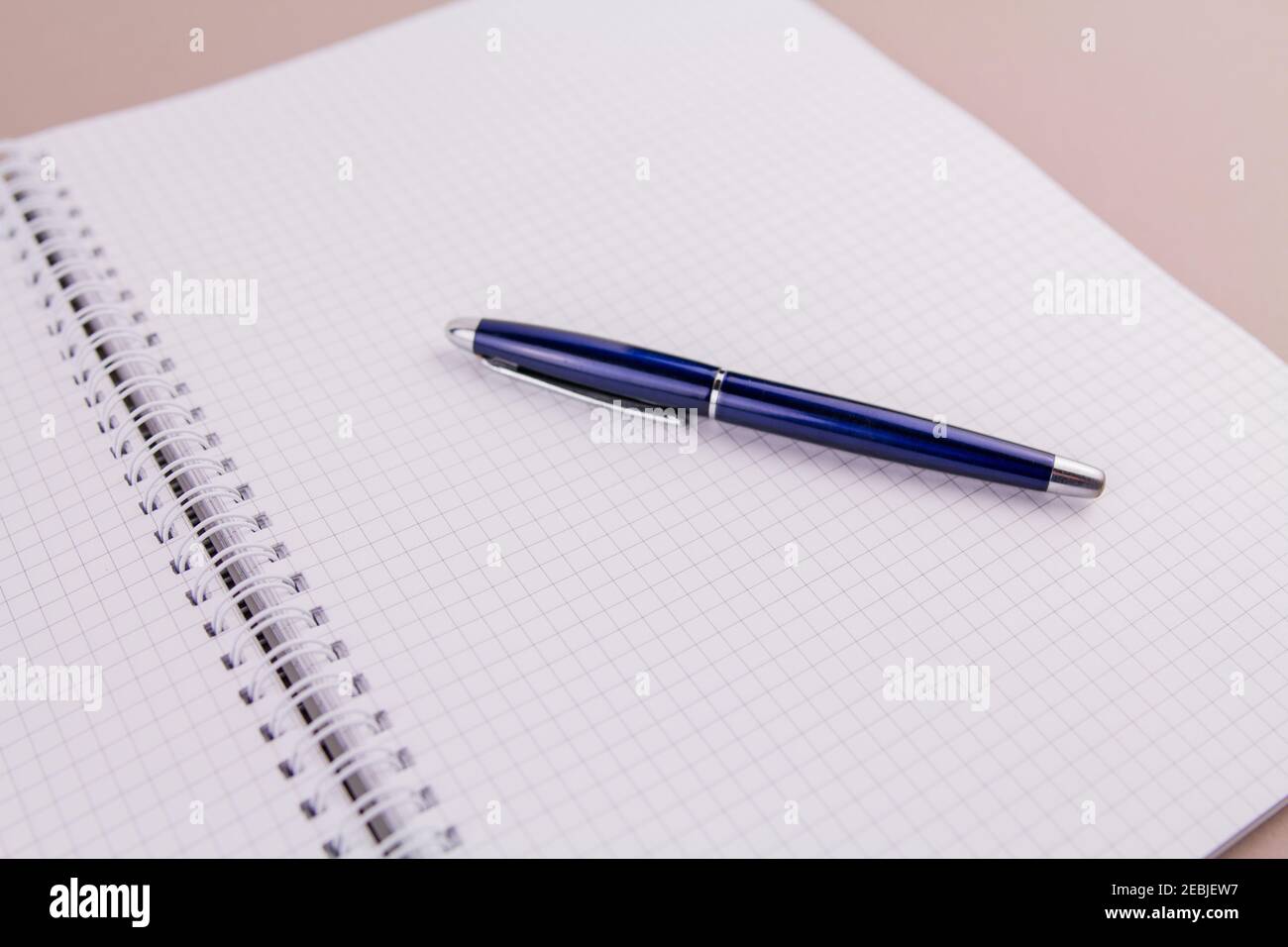 a beautiful pen on a4 notebook for study or work Stock Photo