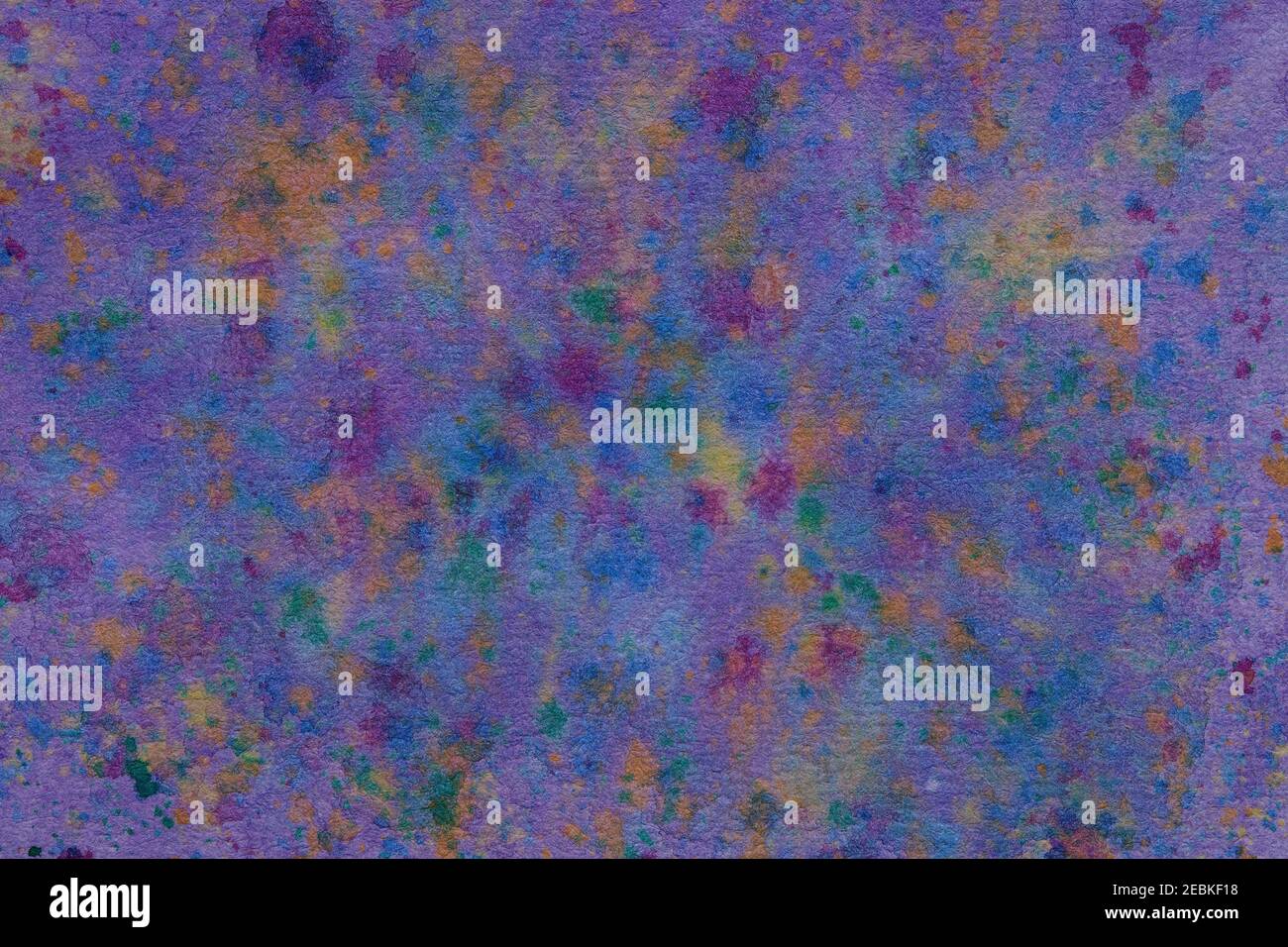 Purple watercolor background with watercolor paint splatter. Stock Photo