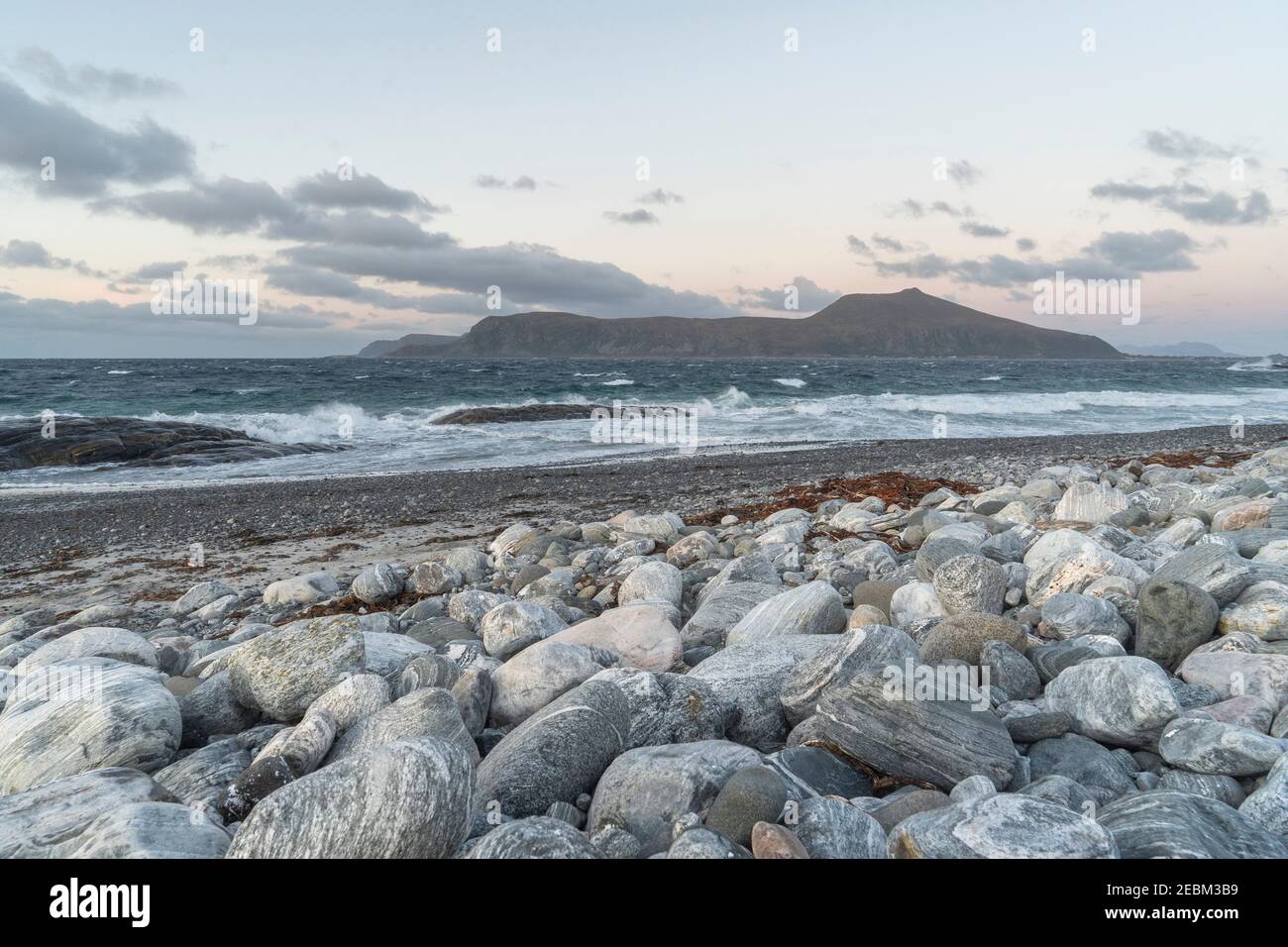 Landscape image from the Norwegian west coast. The island in the background is soon to be populated with wind turbines, changing the landscape. Stock Photo