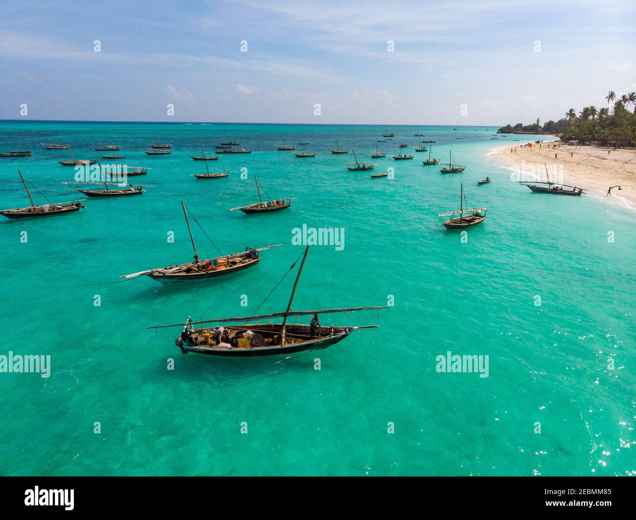Traditional African Wooden Dhow Boats on Clean Turquoise Water near the
