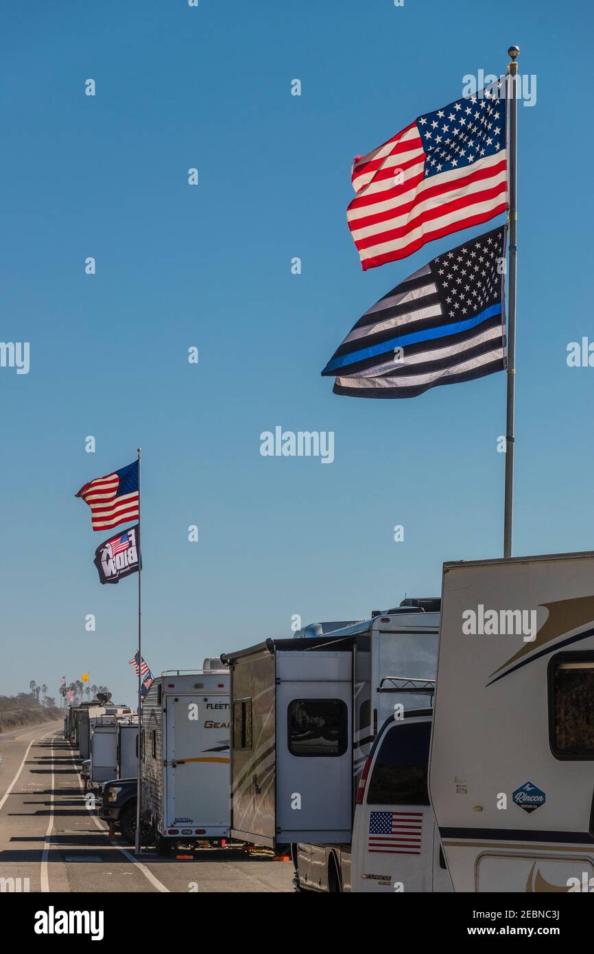 Trump Thin blue line flag and American flags on RVs Stock Photo