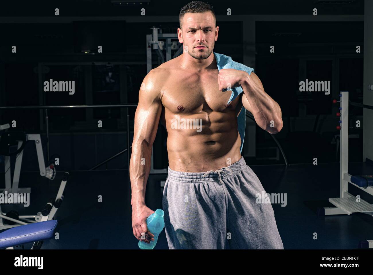 Sport health. Stay hydrated concept. Weightlifter gym man preparing for  training. Muscular athletic body Stock Photo - Alamy
