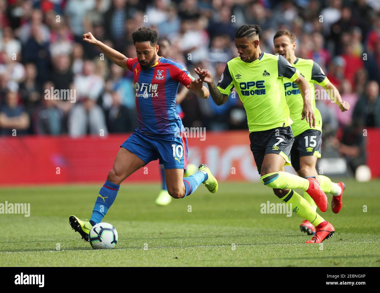 Soccer Football - Premier League - Crystal Palace v Huddersfield Town - Selhurst Park, London, Britain - March 30, 2019 Crystal Palace's Andros Townsend in action with Huddersfield Town's Juninho Bacuna REUTERS/Hannah McKay EDITORIAL USE ONLY. No use with unauthorized audio, video, data, fixture lists, club/league logos or "live" services. Online in-match use limited to 75 images, no video emulation. No use in betting, games or single club/league/player publications. Please contact your account representative for further details. Stock Photo