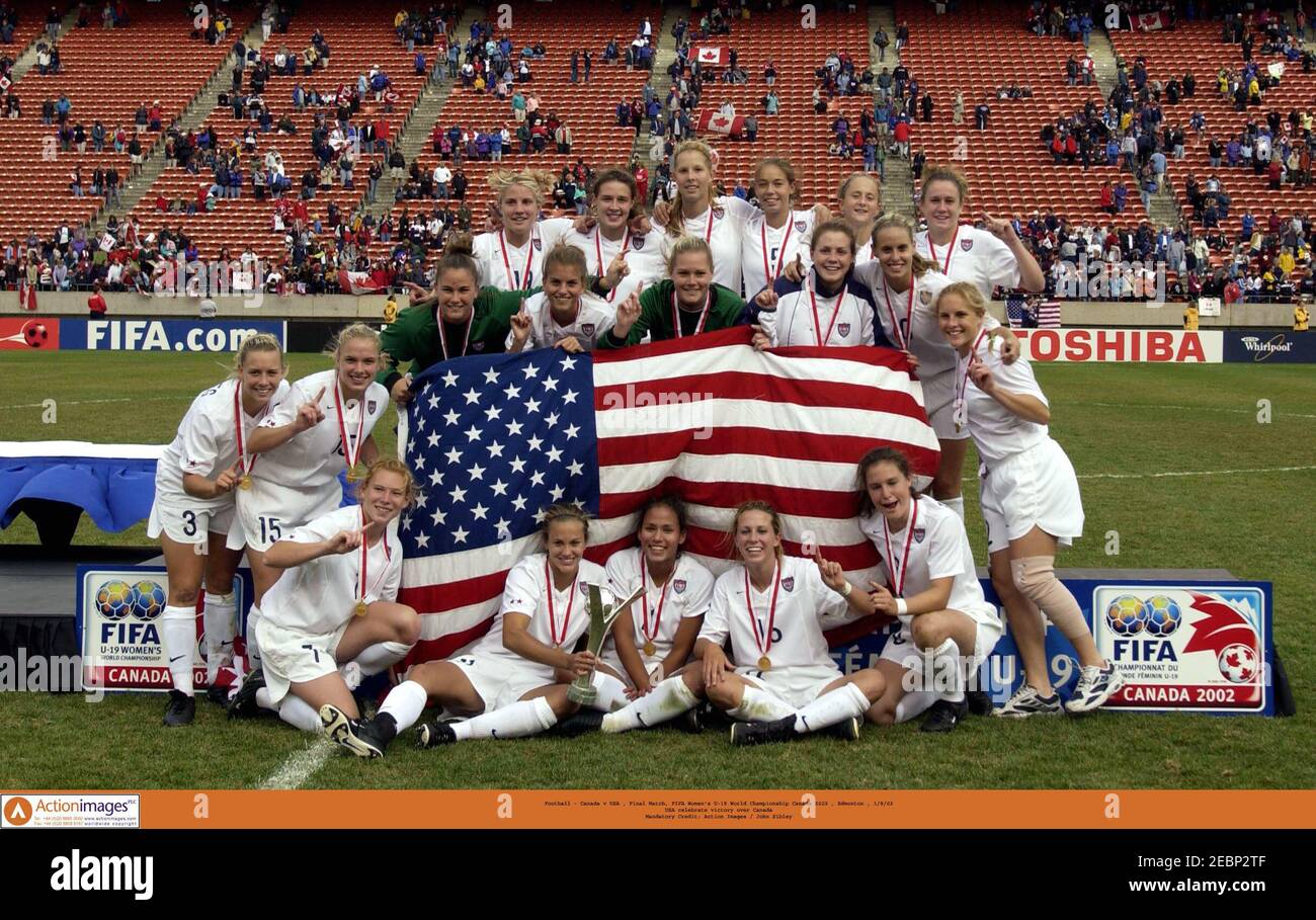 Football - Canada v USA , Final Match, FIFA Women's U19 World Championship  Canada 2002 , Edmonton , 1/9/02 USA celebrate victory over Canada Mandatory  Credit: Action Images / John Sibley Stock Photo - Alamy