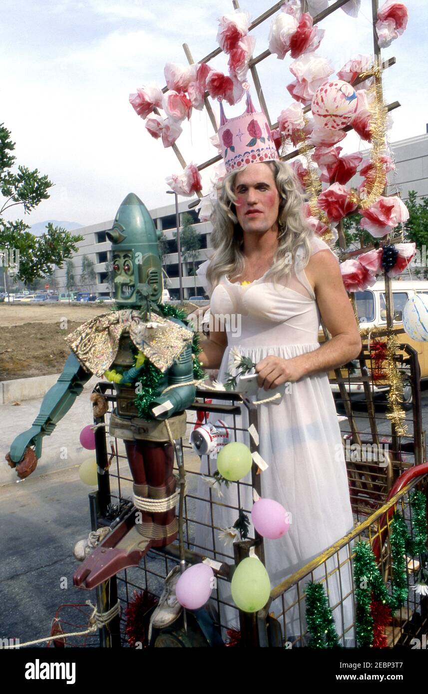 Male participant spoofing the Rose Parade Queen in the Doo Dah Parade in Pasadena, CA Stock Photo