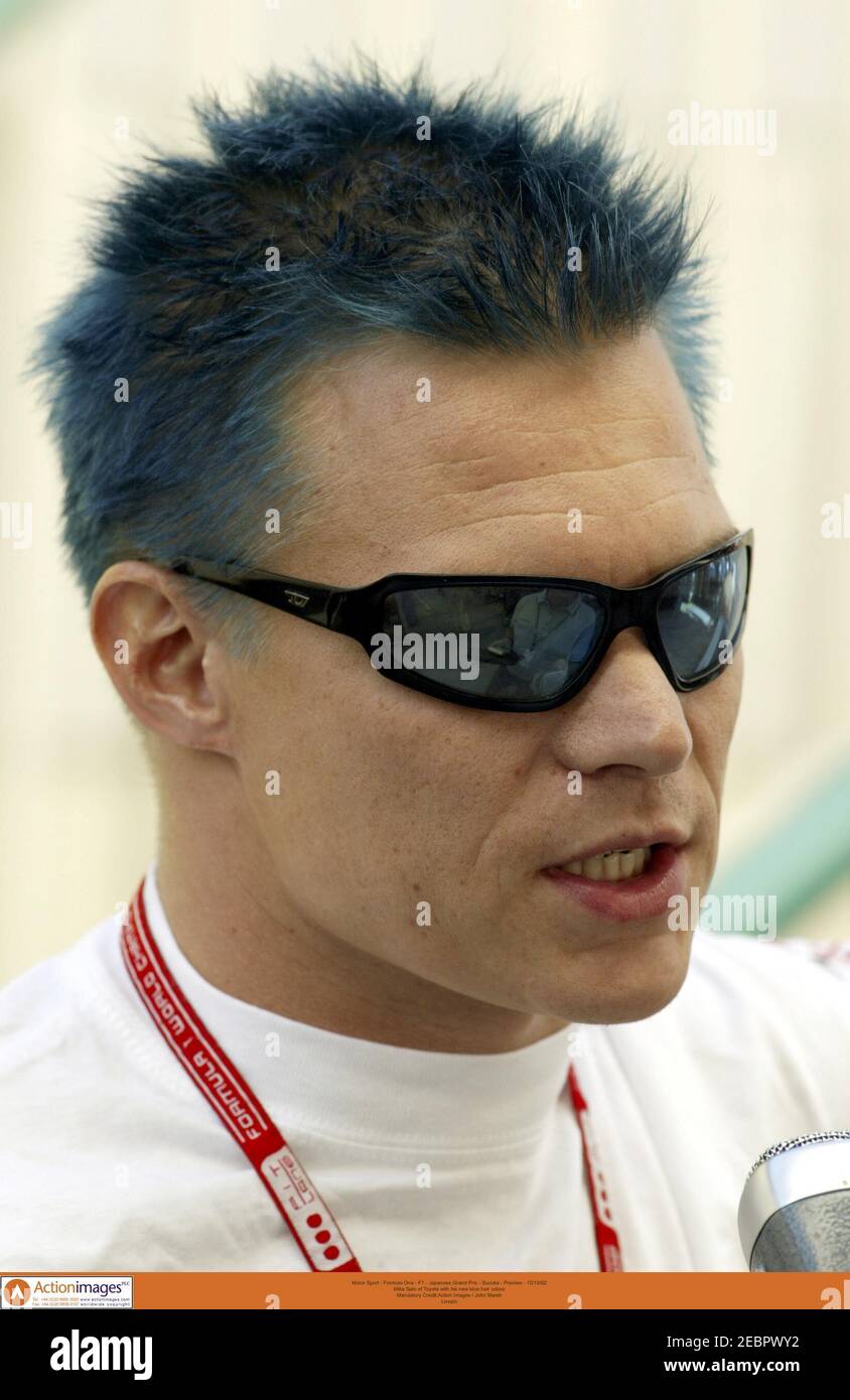 Motor Sport - Formula One - F1 - Japanese Grand Prix - Suzuka - Preview -  10/10/02 Mika Salo of Toyota with his new blue hair colour Mandatory  Credit:Action Images / John Marsh Livepic Stock Photo - Alamy