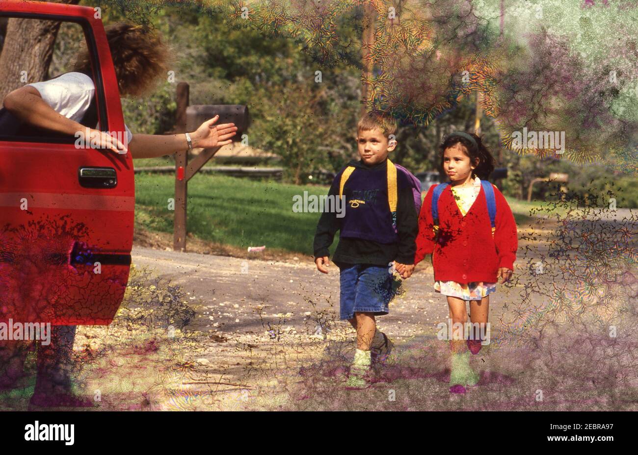 Stranger Danger: 3rd graders walking home from school avoid stranger in car, 1994 Model Released EI-0319-0321. ©Bob Daemmrich Stock Photo
