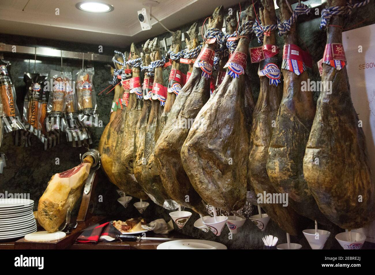 A view of various hams (known as jamones in Spanish) in a bar in