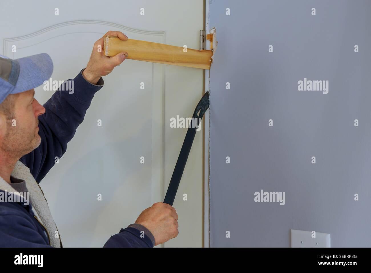 Preparation installing in new home wooden of interior room doors on